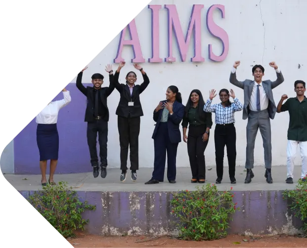 Young men playing basketball outdoors