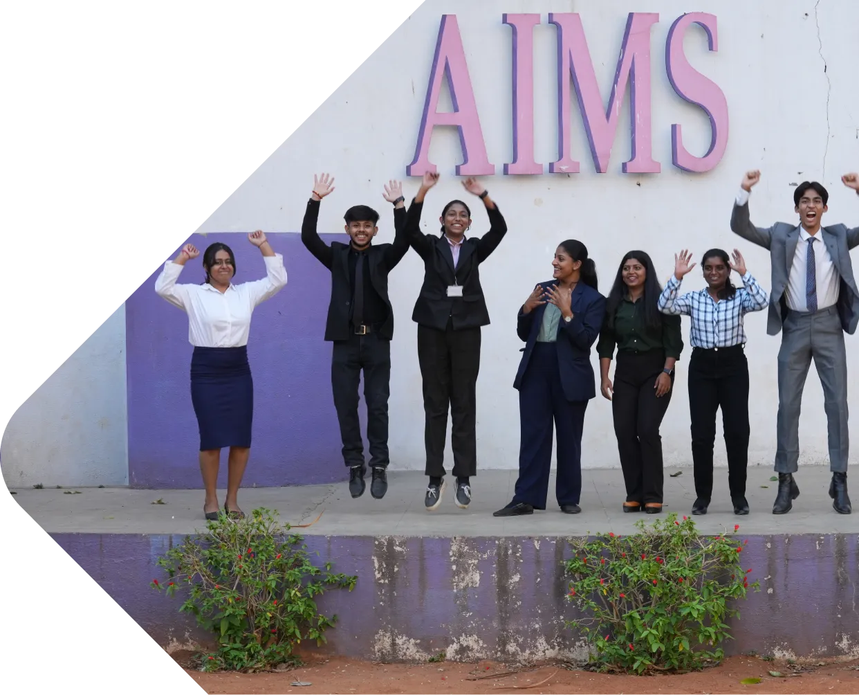 Young men playing basketball outdoors